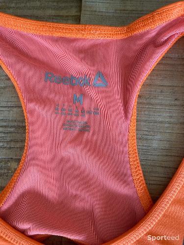 Sportswear - Brassière multisports orange Reebok - photo 6