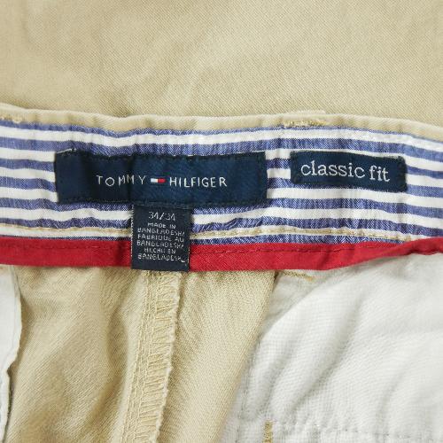 Golf - Tommy Hilfiger Pantalon chino Classic Fit Taille W34/L34 Homme Beige #QWE3118 - photo 9