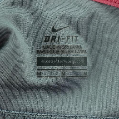 Course à pied trail - Nike Brassières Dri-Fit Coupe compression Bonnet moulés Dos nageur en mesh Femme Taille M - photo 5