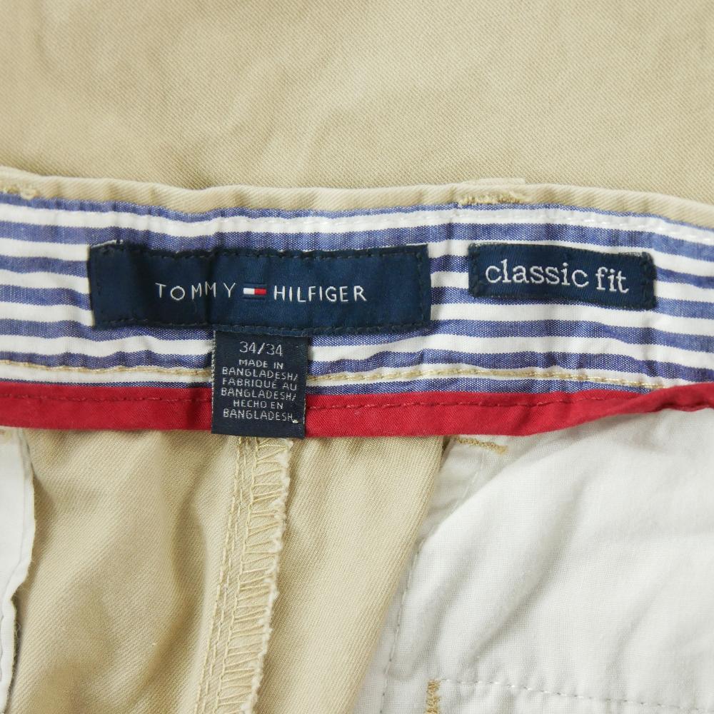 Golf - Tommy Hilfiger Pantalon chino Classic Fit Taille W34/L34 Homme Beige #QWE3118 - photo 8